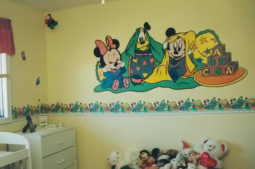 Wall mural of Mickey, Minnie and Goofy for a baby's room