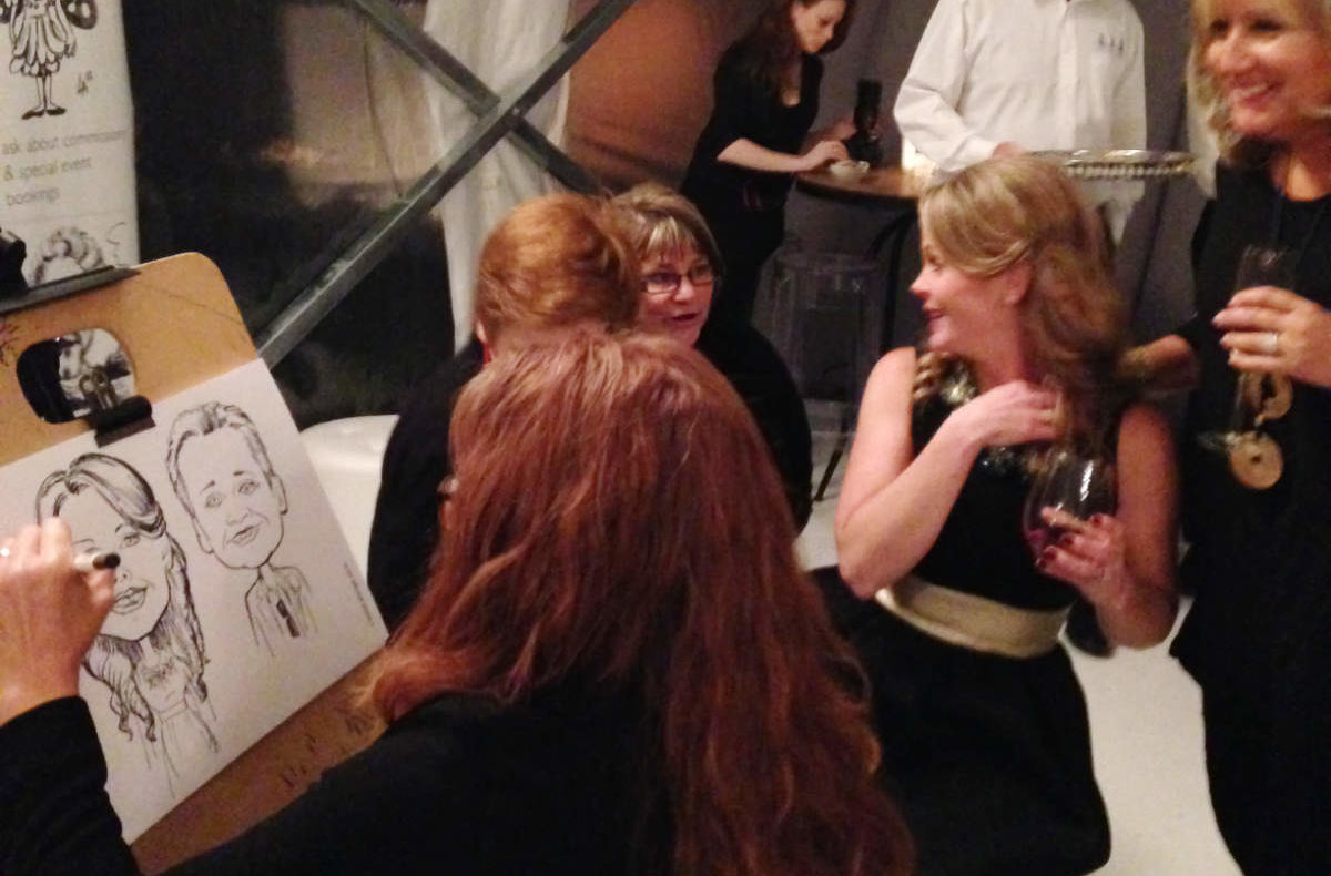 Caricature drawing at a high end wedding, drawing the bride