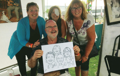 caricature drawing at outdoor festival