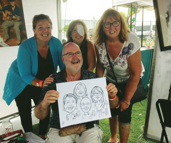 caricature drawing at outdoor festival
