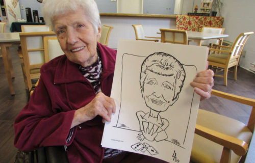 Caricature drawing on the spot at retirement home