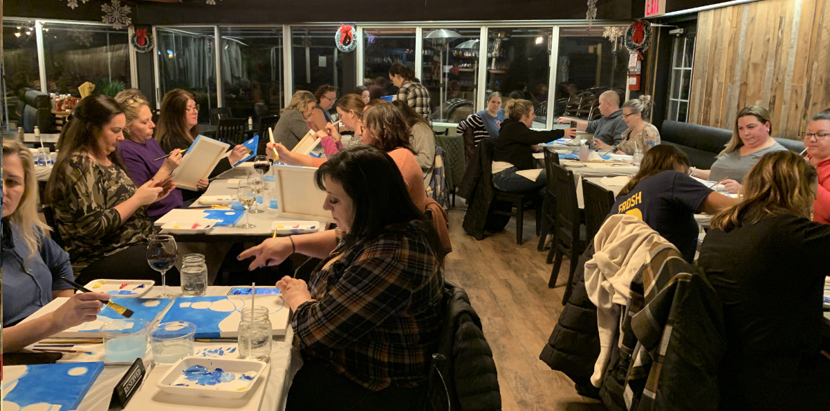 Wine and Paint night art students in December