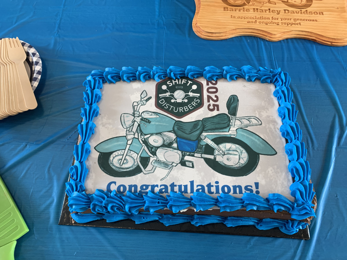 motorcycle sketch on a cake to celebrate conclusion of program