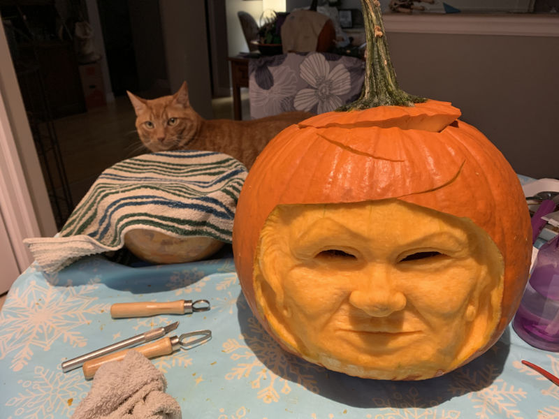 3D pumpkin carving of a clown face in process